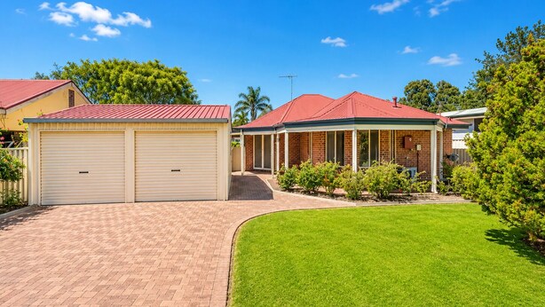 A residential property with a garage, a covered outdoor area, and a well-maintained lawn. - Hidden Gem Getaway in Dunsboroughs Heart (Dunsborough)