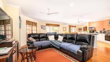 Comfort House | Living area | 55-inch TV with digital channels