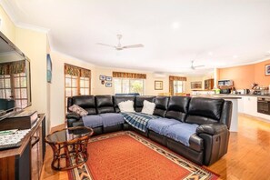 Comfort House | Living area | 55-inch TV with digital channels