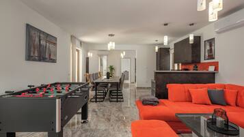 Family Villa, Multiple Bedrooms (Villa Erla) | Living area | 21-inch flat-screen TV with satellite channels