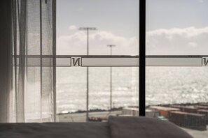 Chambre Premium, 1 très grand lit | Vue sur la plage/l’océan