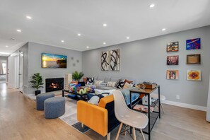 TV, fireplace, table football, books