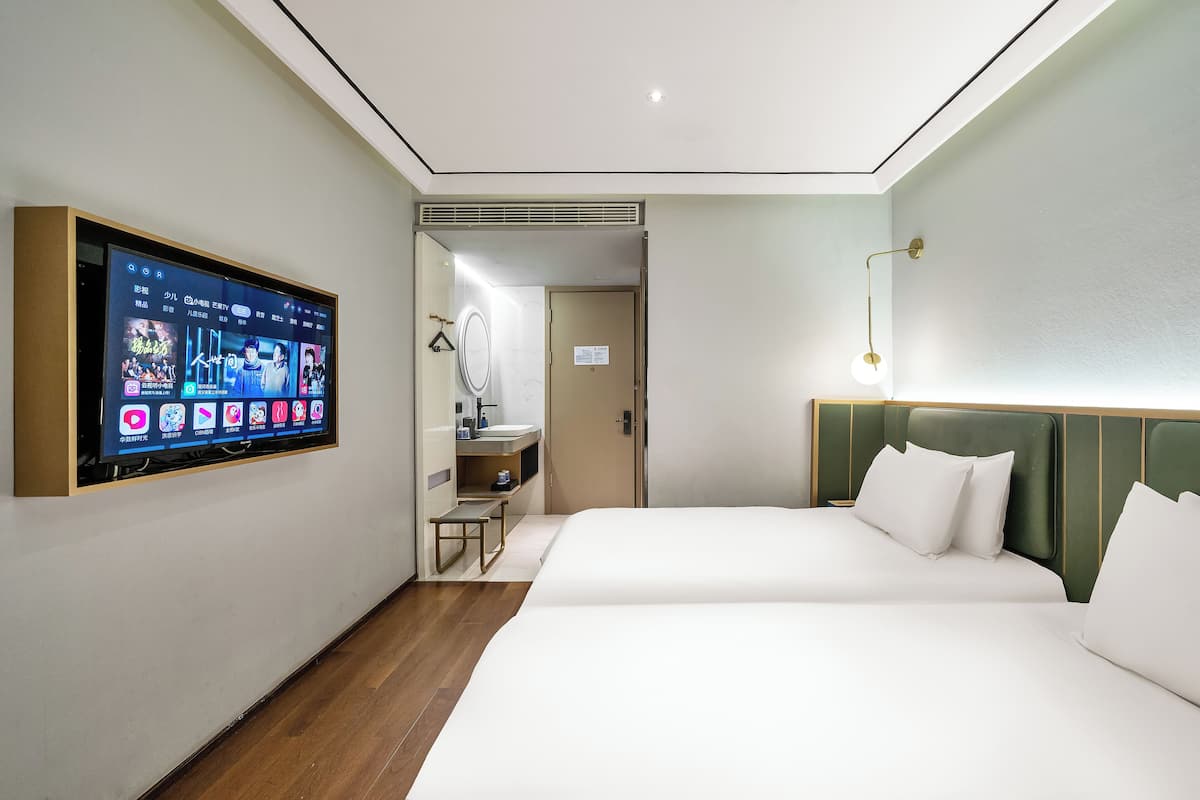 Premium bedding, memory-foam beds, iron/ironing board, free WiFi