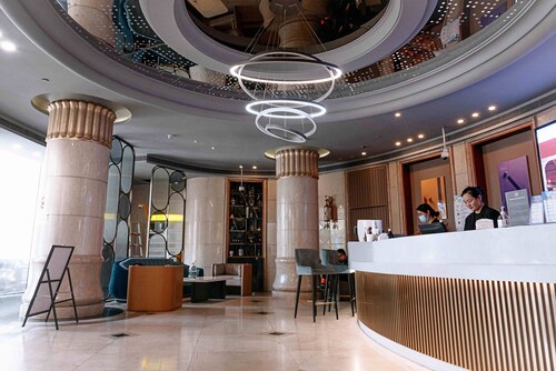 Qinfengyuan Hotel (Shanghai Xuhui District Zhongshan Hospital Jiashan Road Subway Station Branch)
