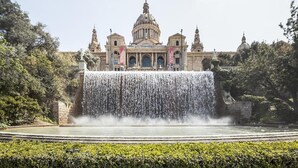 A grand building with a large central dome and a cascading waterfall in front. - Apartment in Barcelona near Seabeach (Barcelona)
