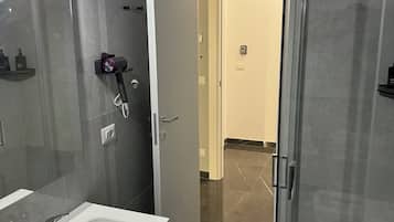 Hair dryer, bidet, towels, soap