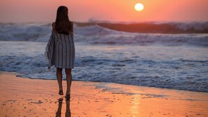 A person walking on a beach during sunset. - San Lameer Villa 3706 (Southbroom)