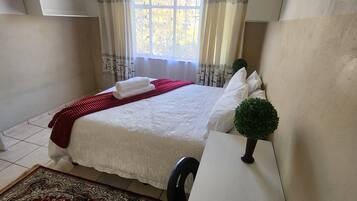 Standard Double Room, 1 Queen Bed, Non Smoking | Bathroom | Shower, towels, soap, toilet paper