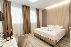 Premium bedding, in-room safe, desk, blackout drapes