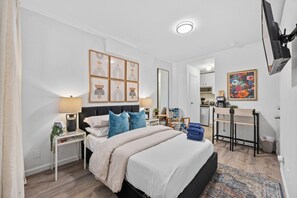 1 bedroom, desk, iron/ironing board, travel cot