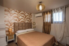 2 室のベッドルーム、セーフティボックス (室内)、WiFi (無料)、ベッドシーツ