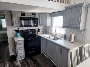 Geladeira, micro-ondas, fogão