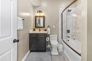 Shower, hair dryer, shampoo