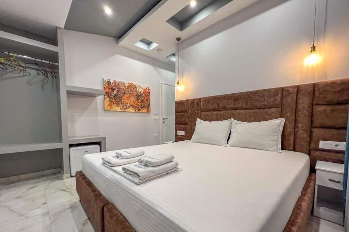 Tweepersoonskamer, balkon | Een bureau, gratis wifi, beddengoed