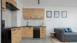 Apartment, 1 Bedroom, Kitchen | Private kitchenette | Microwave, dishwasher, cookware/dishes/utensils, dining tables - Bytnara One Bedroom Apartment by Renters (Warsaw)