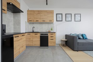 Apartment, 1 Bedroom, Kitchen | Private kitchenette | Microwave, dishwasher, cookware/dishes/utensils, dining tables - Bytnara One Bedroom Apartment by Renters (Warsaw)