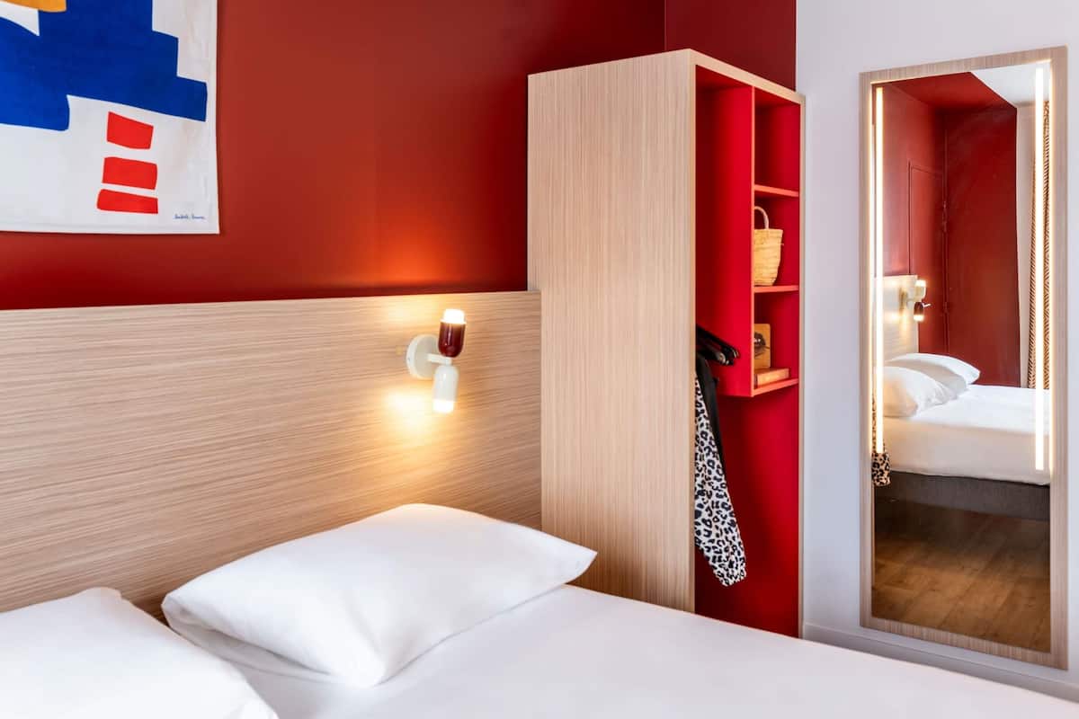 Blackout drapes, soundproofing, iron/ironing board