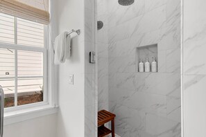 Shower, hair dryer, towels