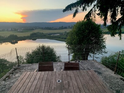Old Jura farmhouse with panoramic view of Lac de l'Abbaye