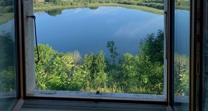 Old Jura farmhouse with panoramic view of Lac de l'Abbaye