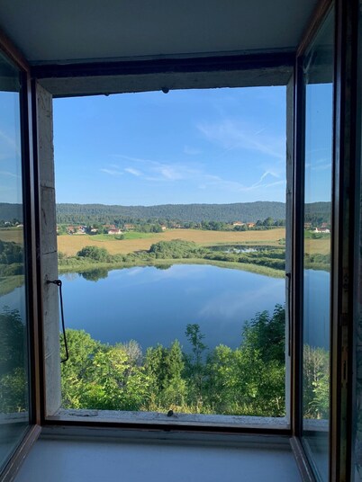 Old Jura farmhouse with panoramic view of Lac de l'Abbaye