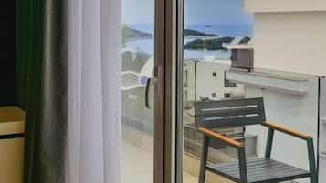 Deluxe Triple Room, Balcony, Sea View | 1 bedroom, desk, soundproofing, free WiFi