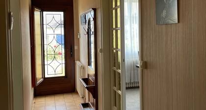 Séjour en pavillon proche des transports et des évÚnements