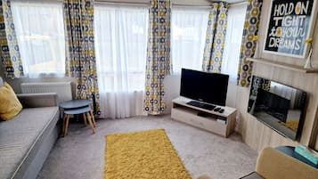 Cabin | Living area | TV, fireplace