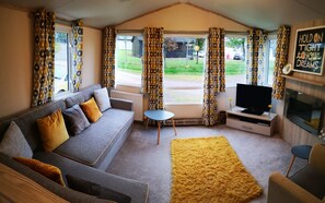 Cabin | Living area | TV, fireplace - Tranquil Lodge Retreat in Beattock (Moffat)