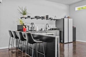 Fridge, microwave, stovetop, coffee/tea maker