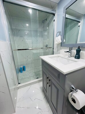 Hair dryer, towels, soap, shampoo