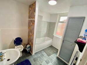 Hair dryer, soap, shampoo, toilet paper