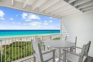 Outdoor dining - Gulf-Front Getaway — Seamist #5 with Bikes & Spectacular Balcony Views (Seacrest)