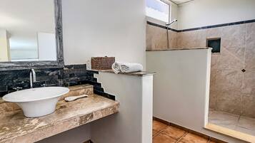 Shower, hair dryer, towels, soap