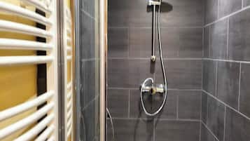Hair dryer, towels, soap, shampoo