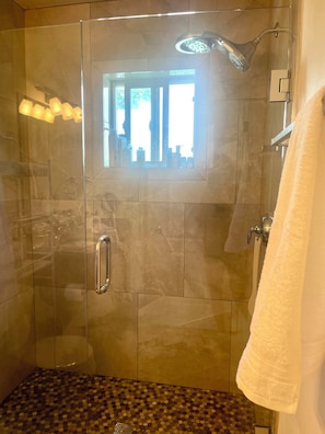 Shower, hair dryer, towels, soap