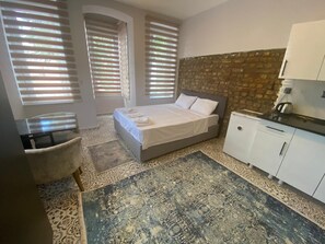 Comfort-Studiosuite, Stadtblick | Schallisolierte Zimmer, Bügeleisen/Bügelbrett, kostenloses WLAN