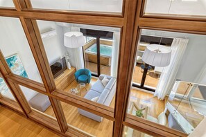 Exclusive-Apartment | Wohnbereich | 50-Zoll-Flachbildfernseher mit Kabelempfang