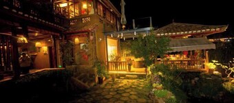 Puzhehei Yeniu Buluo Inn