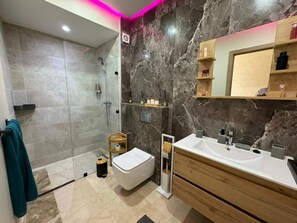 Shower, hair dryer, towels, soap