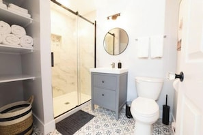 Hair dryer, towels, soap, shampoo