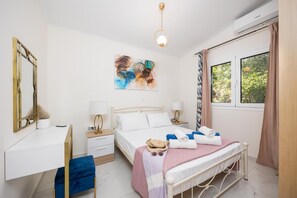 2 quartos, ferros/tábuas de passar roupa, Wi-Fi, roupa de cama