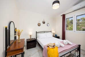 2 dormitorios, tabla de planchar con plancha, wifi y ropa de cama