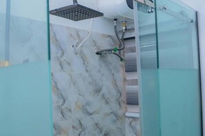 Shower, towels, toilet paper - Bamgbose Apartments in Surulere, Lagos Nigeria (Lagos)