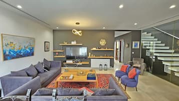 Luxury Villa, 3 Bedrooms | Living area | 65-inch flat-screen TV with satellite channels, computer monitors