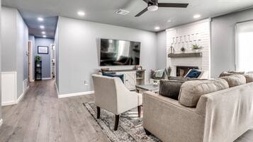 House | Living area | 75-inch Smart TV with digital channels