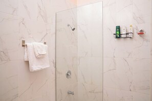 Shower, towels, soap, shampoo