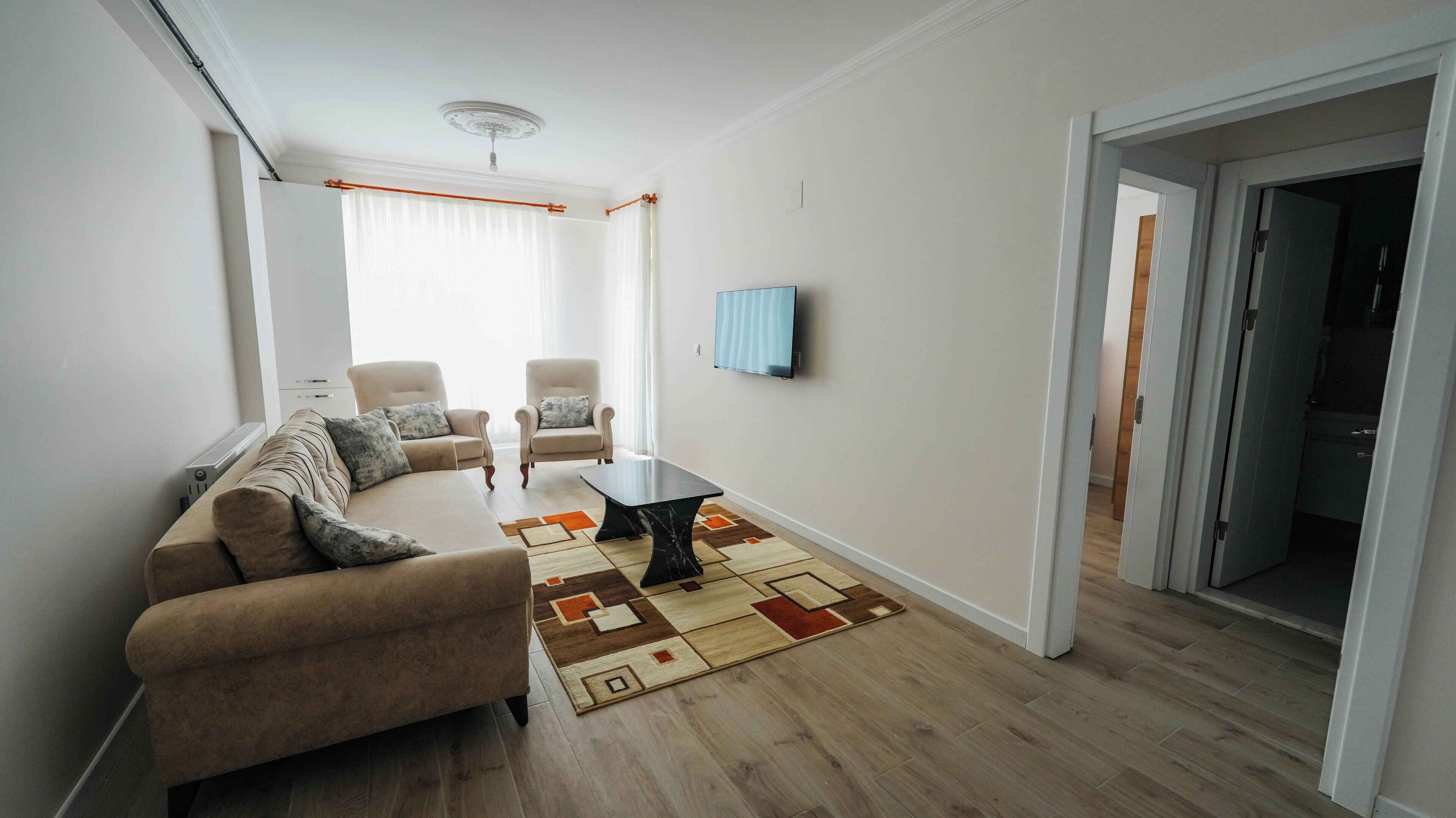 Leilighet – deluxe | Oppholdsområde | TV