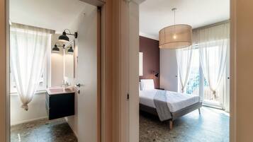 2 bedrooms, premium bedding, down duvets, iron/ironing board