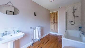 Shower, hair dryer, towels, shampoo